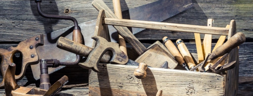 Wooden carpenters box with tools