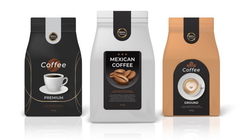 Bags of coffee receiving coffee labels.