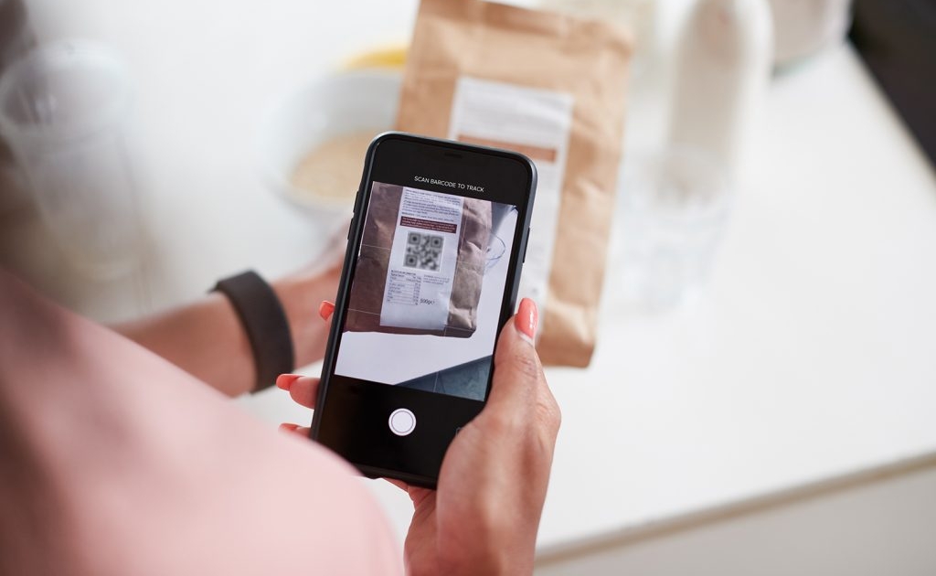 Connected packaging label with a QR code.