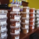 Filled containers with product labels.