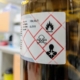 Secondary container with proper labels at a work site.