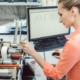 Technician repairing a commercial labeling system.