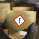 A package labeled with a GHS symbol for hazardous chemicals.