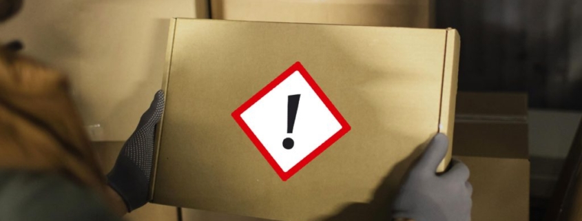 A package labeled with a GHS symbol for hazardous chemicals.