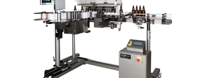 Automatic Bottle Labeling Machine–Vertical Trunnion Roller--loaded with beer bottles.