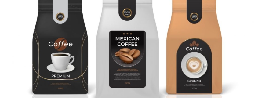Bags of coffee receiving coffee labels.