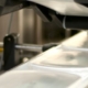 Commercial labeling system applying labels to products.